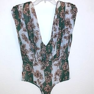 Cute fashionable sleeveless bodysuit green white and tan floral design size M